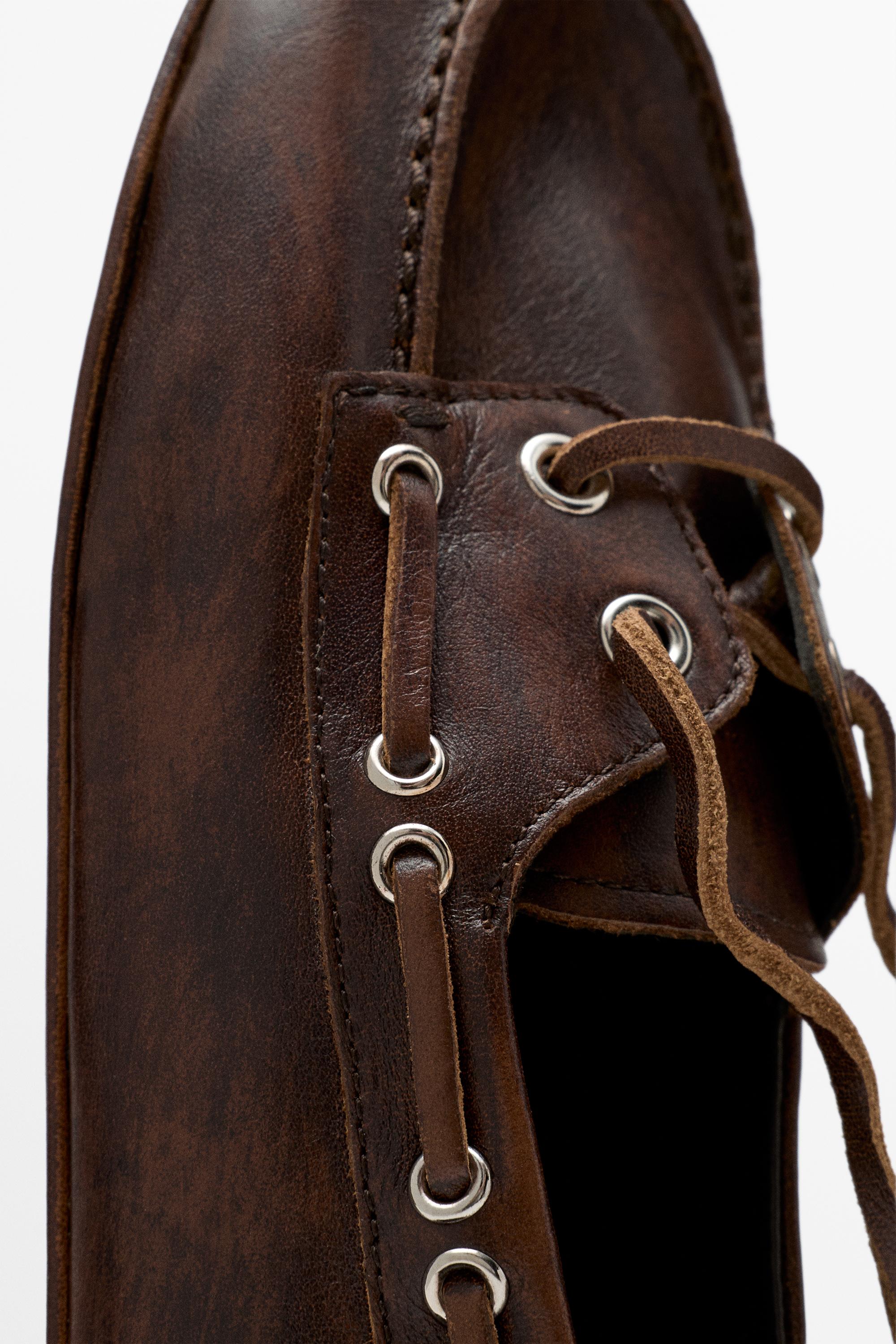 Leather lace-up boat shoe